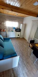 Η κουζίνα ή μικρή κουζίνα στο La Paloma Alojamiento