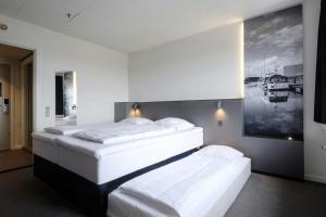 Postel nebo postele na pokoji v ubytování Four Points Flex by Sheraton Ishoj