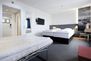 Postel nebo postele na pokoji v ubytování Four Points Flex by Sheraton Ishoj