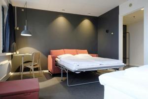 Ένα ή περισσότερα κρεβάτια σε δωμάτιο στο Four Points Flex by Sheraton Ishoj +12 φωτογραφίες