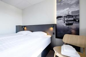 Postel nebo postele na pokoji v ubytování Four Points Flex by Sheraton Ishoj