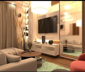 TV a/nebo společenská místnost v ubytování Ontario Hotel & Apartment
