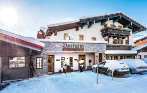 Pension Restaurant Dorfalm að vetri til