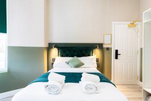 The Chapter Hotels - Finsbury Park客房内的一张或多张床位