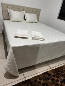Postel nebo postele na pokoji v ubytování Casa aconchegante