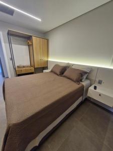 Postel nebo postele na pokoji v ubytování AP 511 - LIVIN Resort Atlântida