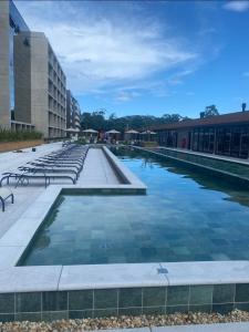 Bazén v ubytování AP 511 - LIVIN Resort Atlântida nebo v jeho okolí