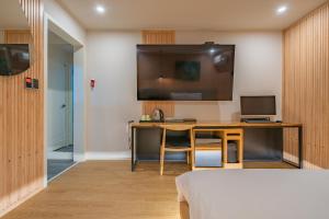 TV a/nebo společenská místnost v ubytování Hotel Yoegieottae Gwangju Station
