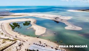 an aerial view of an island in the ocean at Pousada Lunar in Parnaíba +18 photos