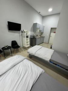 Ένα ή περισσότερα κρεβάτια σε δωμάτιο στο Berlin City 102