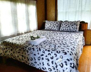 Postel nebo postele na pokoji v ubytování DoiLom Farmstay