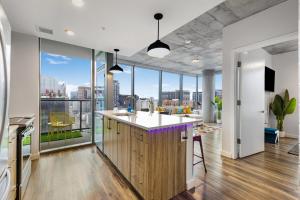 an open kitchen with a view of a city at The Urban Kaleidoscope Downtown Nashville in Nashville