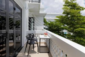 Balkón nebo terasa v ubytování SUNRISE Hotel Bạc Liêu