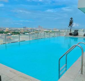 a large swimming pool on the roof of a building at Mabolo Garden Flats 2312 in Cebu City