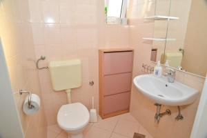 Koupelna v ubytování Apartments Lonić