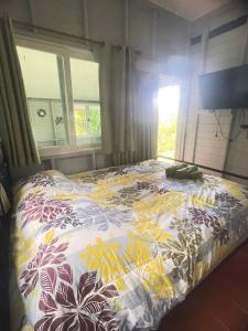 Postel nebo postele na pokoji v ubytování One khaokho homestay