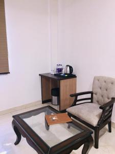 Příslušenství pro přípravu čaje a kávy v ubytování Hotel Gharana Tree