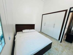 Postel nebo postele na pokoji v ubytování Xa Ly Villa Mộc Châu + 2 fotografie