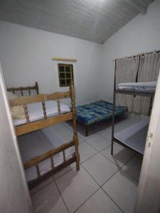 Postel nebo postele na pokoji v ubytování Amor Real