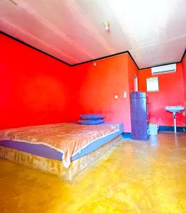Perwita Homestay客房内的一张或多张床位