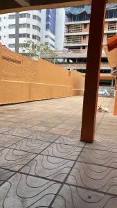 a view of a patio with a geometric design on the floor at Pousada Pimenta in Torres