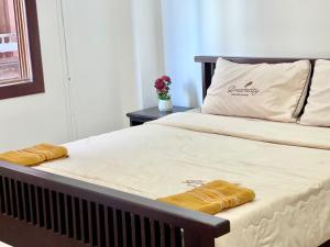 Postel nebo postele na pokoji v ubytování RS Central Apartments - 200m to Royal Palace