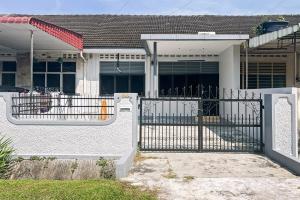 a white house with a gate in front of it at Homestay Taman Canning Ipoh, Perak - Smarthome in Ipoh