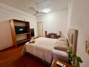 Katil atau katil-katil dalam bilik di Huitzilin Hostal