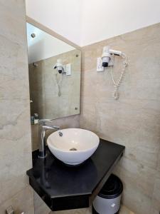 Koupelna v ubytování Rajarata Hotel Anuradhapura