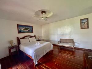 Llit o llits en una habitació de Agoho Resort