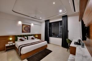 Giường trong phòng chung tại Soil to Soul Trinity Hotel - A Boutique Stay