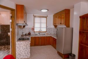Kuchyň nebo kuchyňský kout v ubytování Agoho Resort + 21 fotografií