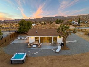 an aerial view of a house with a pool at Wind View in Pioneertown