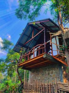 a tree house on top of a building at Ella Sky Cabana in Ella