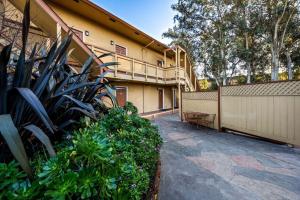 a building with a balcony on the side of it at Howard Johnson by Wyndham Santa Cruz in Santa Cruz