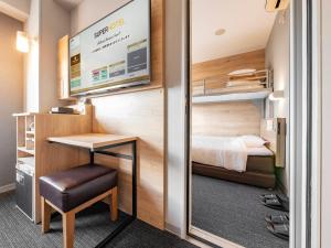 Postel nebo postele na pokoji v ubytování Super Hotel Gotemba Nigo-Kan
