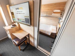 TV a/nebo společenská místnost v ubytování Super Hotel Gotemba Nigo-Kan