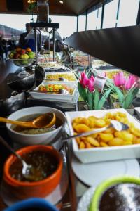 a buffet with many different dishes of food on a table at Sheki Palace Hotel in Sheki +124 photos