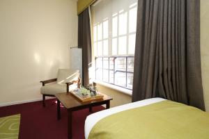 Mahogany Inn and Distillery客房内的一张或多张床位