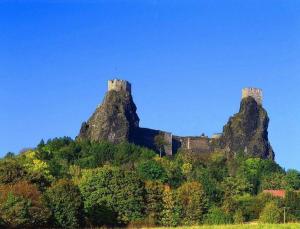 two castles on top of a hill with trees at Chalupa Trosenka in Troskovice