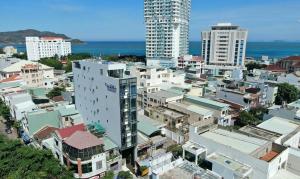 an aerial view of a city with tall buildings at Aloha Hotel in Quy Nhon