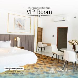Una habitación de hotel con una cama, una mesa y sillas. en Villa Rosal Beach Resort, en Limao