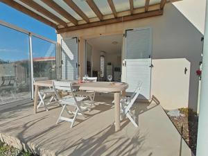 Balkón nebo terasa v ubytování Maison 3 pièces 6 couchages PORT LEUCATE NATURISME PL040-046