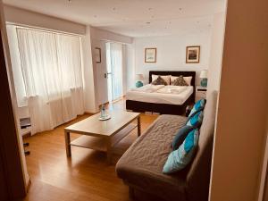 Postel nebo postele na pokoji v ubytování Hotel Hofmann Zur Mühle + 37 fotografií