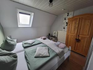 Postel nebo postele na pokoji v ubytování Ferienwohnung Naturblick