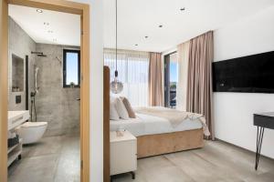 Ένα ή περισσότερα κρεβάτια σε δωμάτιο στο Fly Room - S1 - MPolo +13 φωτογραφίες