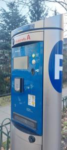 a water machine sitting on the side of a street at Hotel Logos Kraków in Krakow