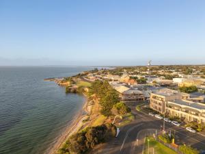 an aerial view of a town next to the water at Ozone Hotel Kangaroo Island in Kingscote