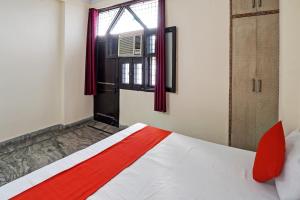 Postel nebo postele na pokoji v ubytování Super Hotel O KHANNA'S HOTEL + 22 fotografií