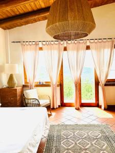 Un pat sau paturi într-o cameră la Casa Paloma Private Villa